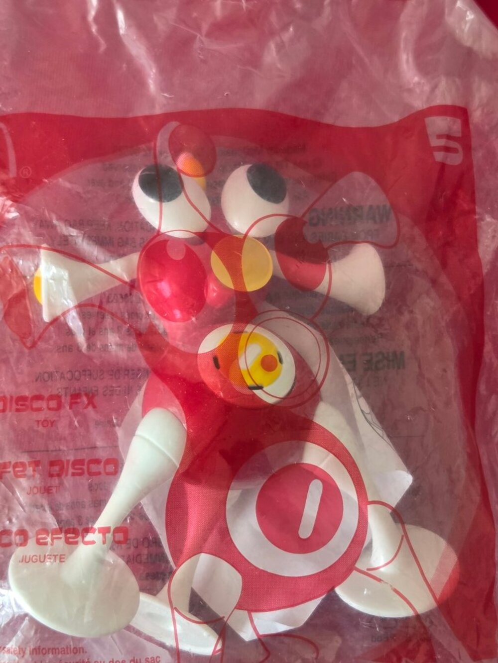 2006 MCDONALD'S, DISCO FX, ZIZZLE TOY, MINT IN THE PACKAGE!!!